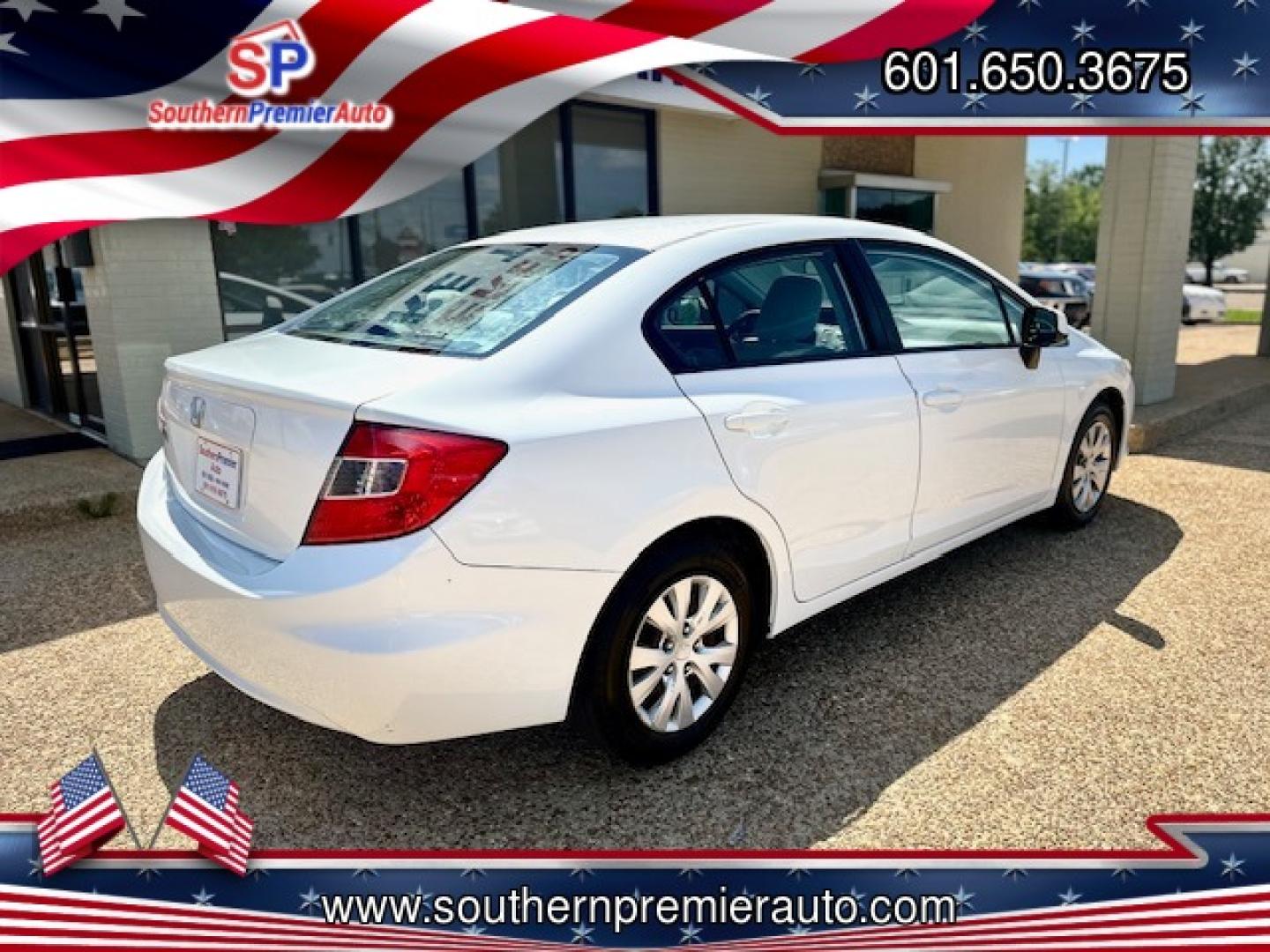 2012 WHITE HONDA CIVIC LX LX (2HGFB2F51CH) with an 1.8L L4 SOHC 16V engine, 5-Speed Automatic transmission, located at 922 W. Beacon St., Philadelphia, MS, 39350, (601) 650-3675, 32.770447, -89.127151 - Title: 2012 Honda Civic LX Sedan Year: 2012 Make: Honda Model: Civic Engine: 1.8L L4 SOHC 16V Body: SEDAN 4-DR Transmission: 5-Speed Automatic Drive Type: FWD Mpg City: 28 Mpg: 39 Trim: LX Sedan - Photo#5
